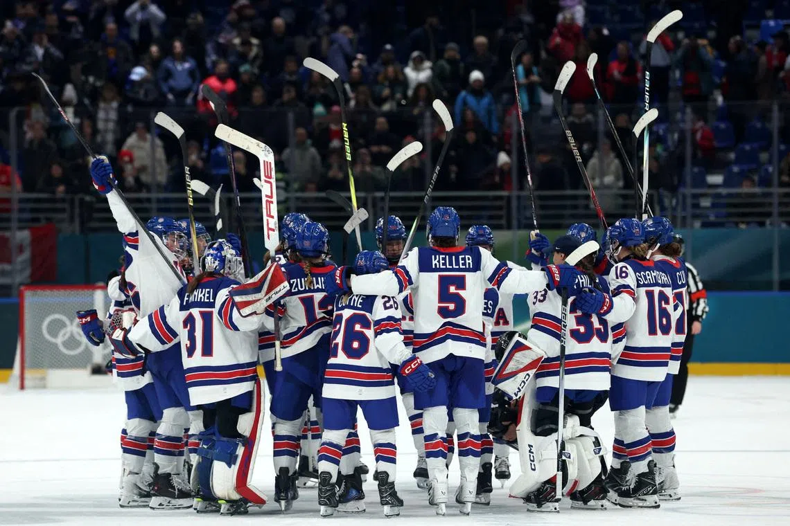 Milano Cortina 2026 Olympics - Ice Hockey - Women's Preliminary Round - Group A - Canada vs United States - Milano Santagiulia Ice Hockey Arena, Milan, Italy - February 10, 2026. United States players celebrate after the match REUTERS/Mike Segar