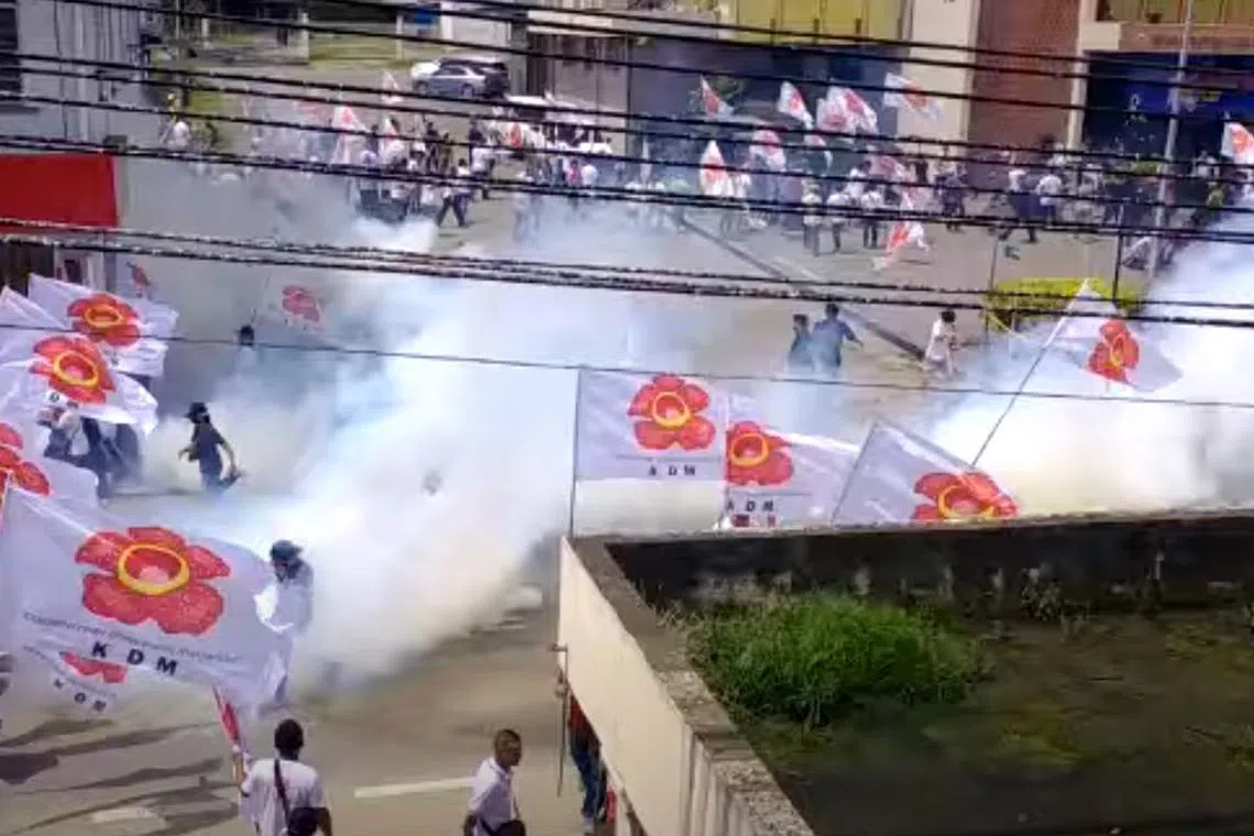Police fire tear gas as Peter Anthony's supporters cause commotion outside nomination centre in Sabah.