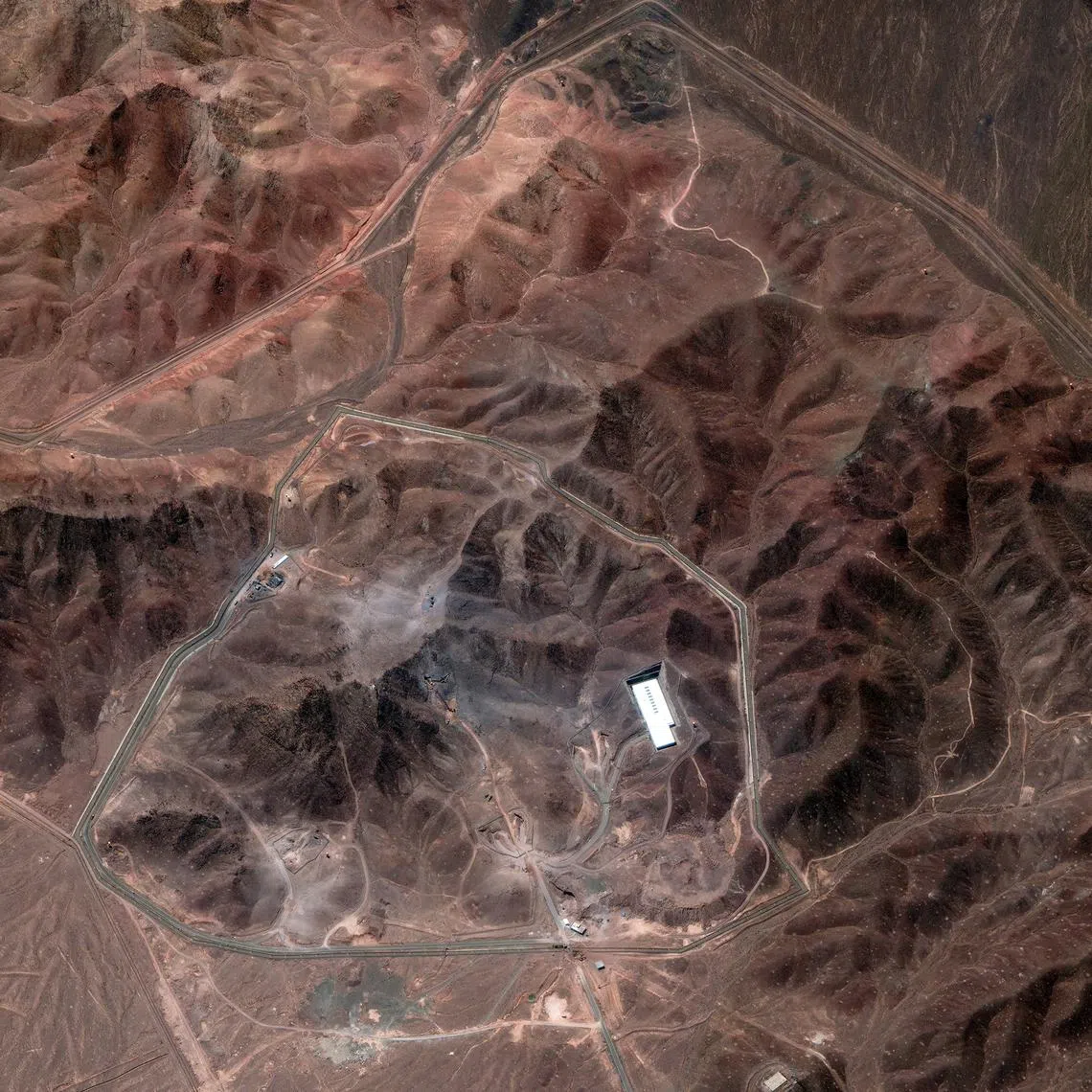 A satellite image of the Iranian nuclear facility at Fordow after US attacks. Iranians consider the plant to be their best-protected and most advanced nuclear enrichment plant.