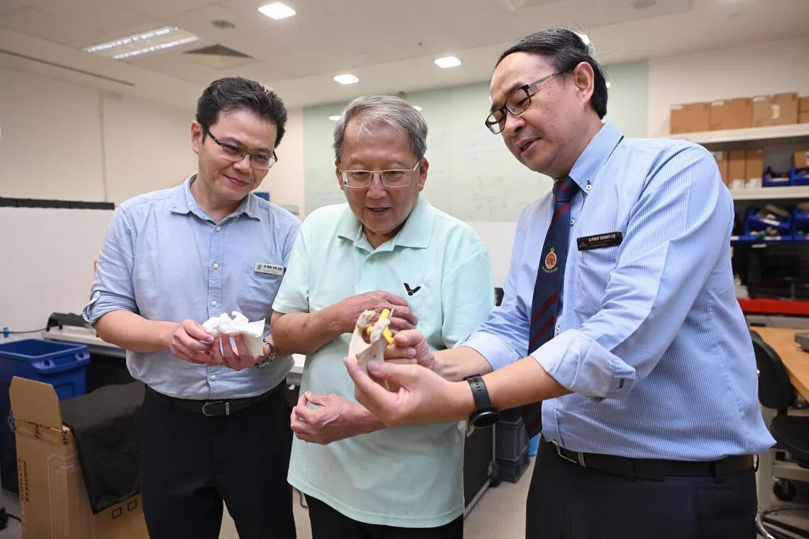 ST20260330_202657600209 Azmi Athni jushoulder//

Dr Wong Yoke Rung (left), senior research fellow at the biomechanics laboratory in Singapore General Hospital (SGH), and Associate Professor Denny Lie (right), a senior consultant for orthopaedic surgery at SGH, shows a 3D printed model of a shoulder to Mr Eric Low (centre), 68, an ITE lecturer who had gone through shoulder replacement surgery, on March 30, 2026. 

ST PHOTO: AZMI ATHNI