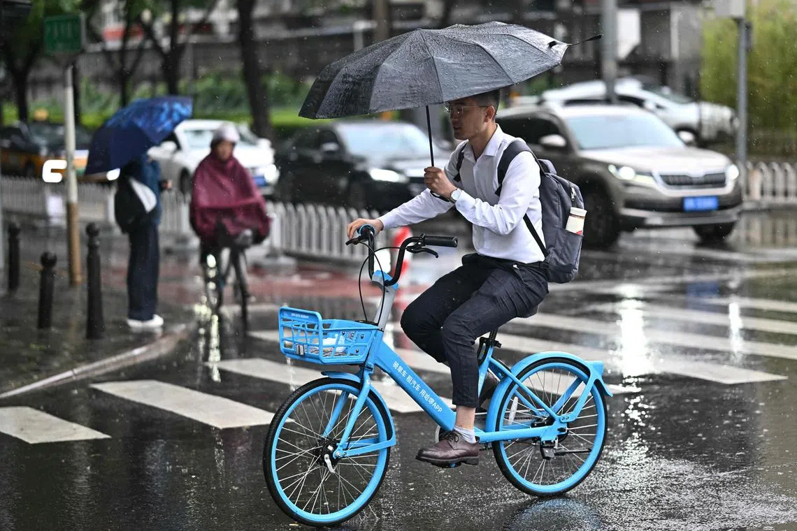 Heatwaves and excessive rain have strained power grids and roiled grain production in China. 