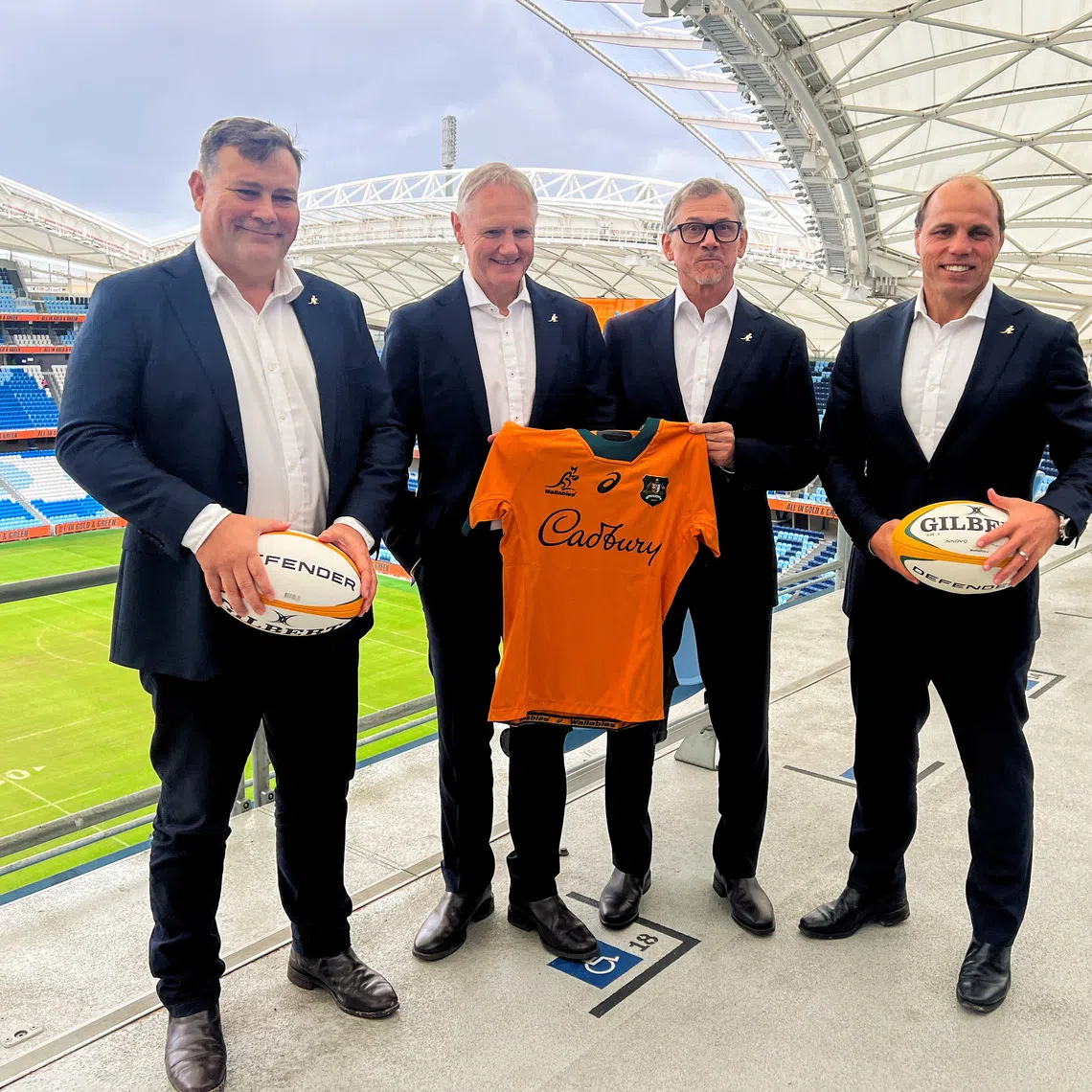FILE PHOTO: Rugby Australia Director of High Performance Peter Horne, Australian National team Rugby Union coach-in-waiting Les Kiss, Australian National Rugby Union team current coach Joe Schmidt and Rugby Australia Chief Executive Phil Waugh pose at Sydney Football Stadium in Sydney, Australia April 30, 2025 . REUTERS/Nick Mulvenney/File Photo