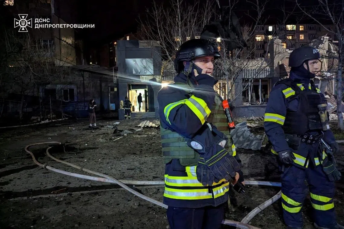 Rescuers work at the site of a Russian missile strike, amid Russia's attack on Ukraine, in Kryvyi Rih, Ukraine March 14, 2025.  Press service of the State Emergency Service of Ukraine in Dnipropetrovsk region/Handout via REUTERS