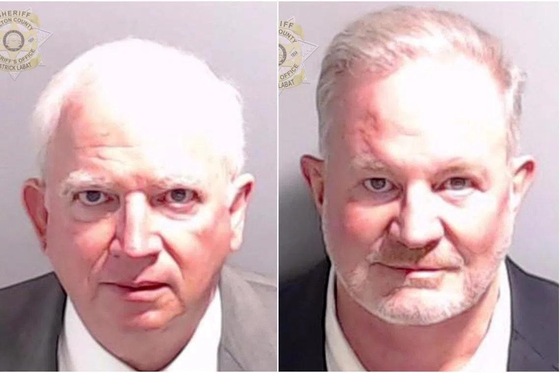 Donald Trump’s former lawyer John Eastman (left) and Republican poll watcher Scott Hall both surrendered to the county sheriff’s office.