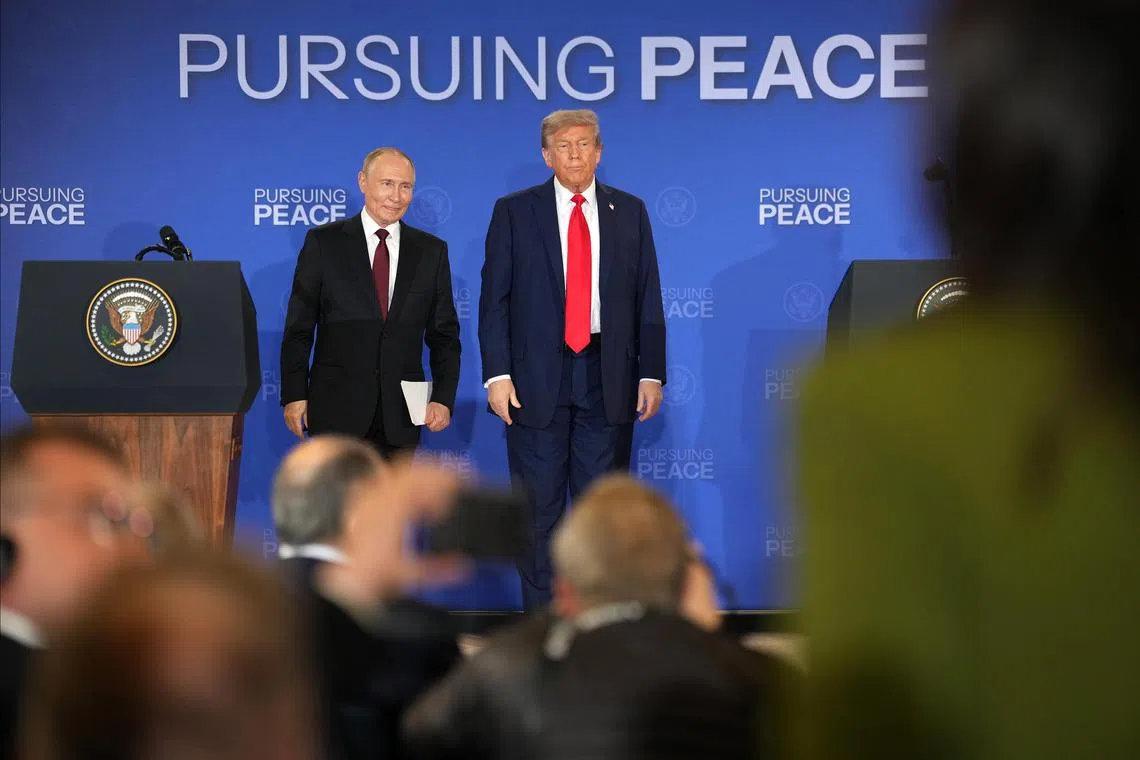 US President Donald Trump (right) and Russian leader Vladimir Putin at a media briefing after their Aug 15 summit in Alaska