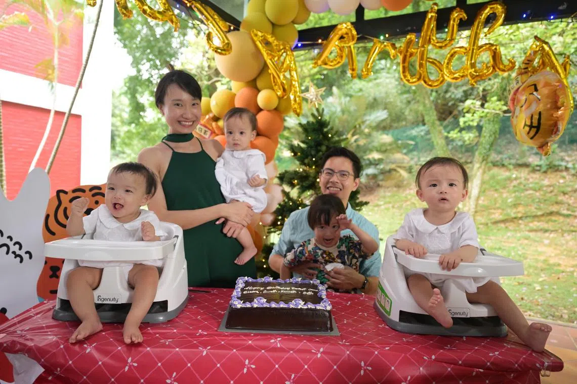 Triplets (from left) Kenneth, Gareth and Seth Chua with their parents, Dr Claire Low and Mr Edwin Chua, and three-year-old brother Keith.
