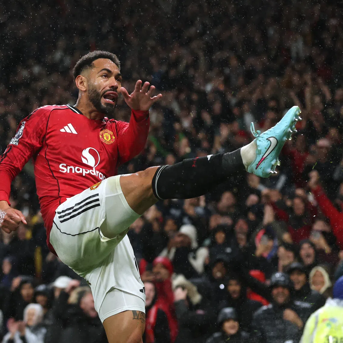 Soccer Football - Premier League - Manchester United v Chelsea - Old Trafford, Manchester, Britain - September 20, 2025 Manchester United's Matheus Cunha celebrates after the match REUTERS/Phil Noble