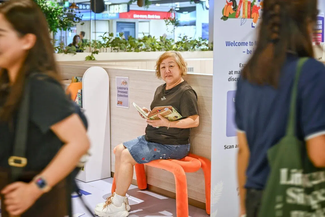 Madam Doris Ng at the Sit-n-Read node at Century Square.