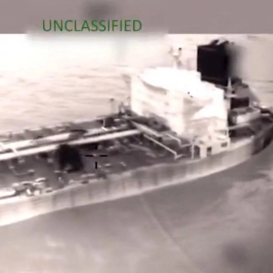 The US Coast Guard boarding and seizing the tanker Olina in international waters east of the Caribbean Sea on Jan 9.