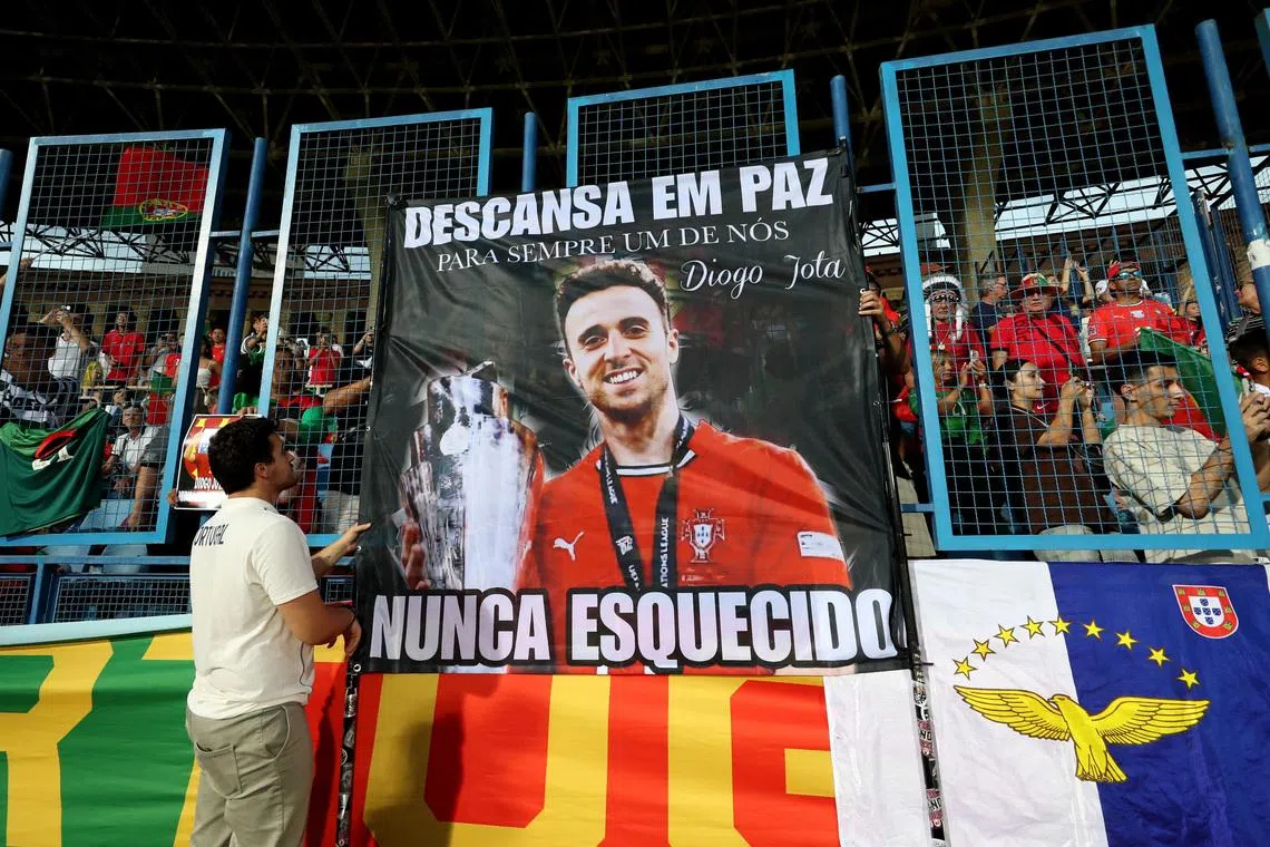 Soccer Football - World Cup - UEFA Qualifiers - Group F - Armenia v Portugal - Vazgen Sargsyan Republican Stadium, Yerevan, Armenia - September 6, 2025 Portugal fans display a banner in memory of Diogo Jota inside the stadium before the match Photolure via REUTERS/Hayk Baghdasaryan