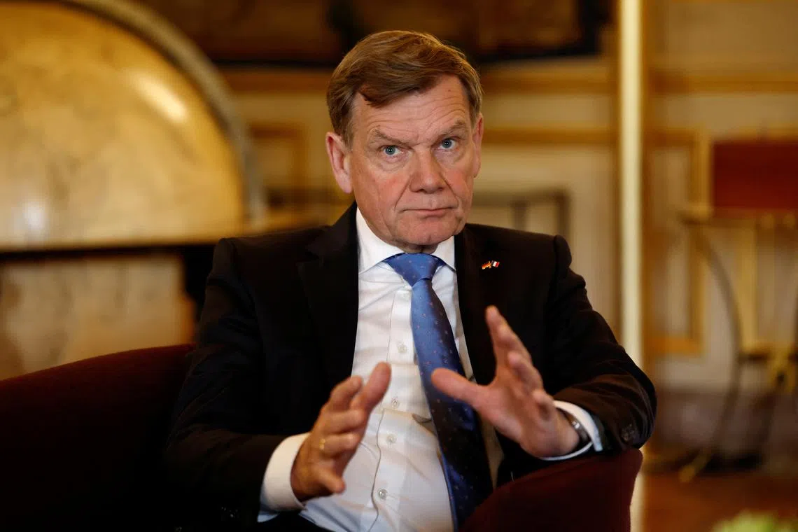 FILE PHOTO: Newly appointed German Foreign Minister Johann Wadephul gestures during a meeting with French Minister for Europe and Foreign Affairs Jean-Noel Barrot (not seen) at the Quai d'Orsay, France's Ministry of Foreign Affairs, in Paris, France, May 7, 2025. REUTERS/Abdul Saboor/Pool/File Photo
