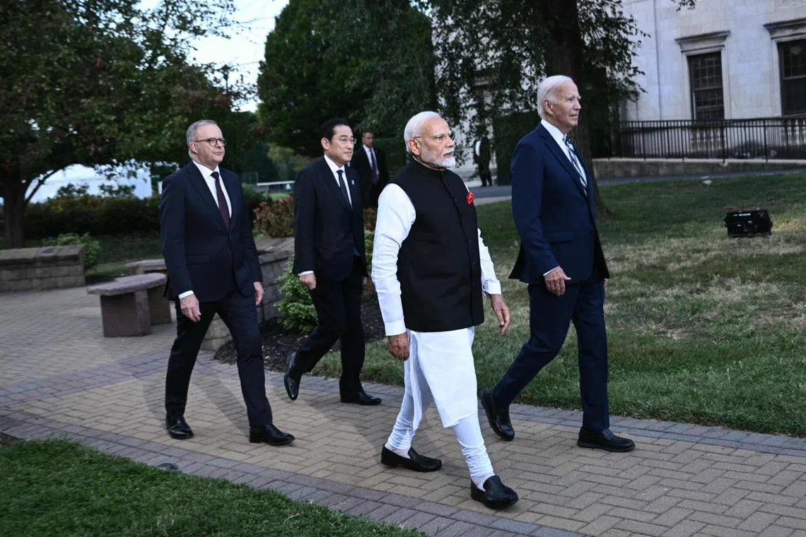 (From left) Quad members Australian PM Anthony Albanese, then Japanese PM Fumio Kishida, Indian PM Narendra Modi, and US President Joe Biden at the Archmere Academy in Wilmington, Delaware, on Sept 21.