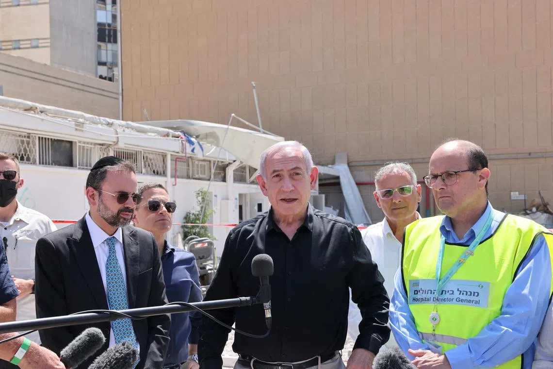 Israeli Prime Minister Benjamin Netanyahu visits the Soroka hospital complex, after it was hit by a missile fired from Iran, in Beer Sheva, Israel on 19 June 2025.    Marc Israel Sellem/Pool via REUTERS