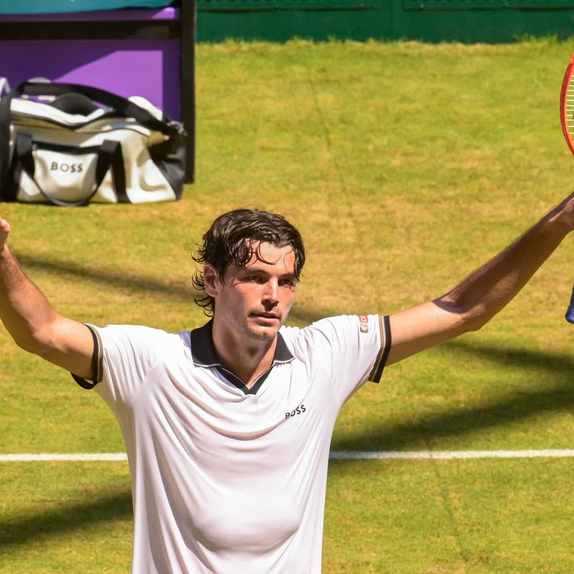 FILE PHOTO: Tennis - ATP 500 - Halle Open - OWL Arena, Halle, Germany - June 19, 2026 Taylor Fritz of the U.S. celebrates after winning his quarter final match against Ben Shelton of the U.S. REUTERS/Fabian Bimmer/File photo