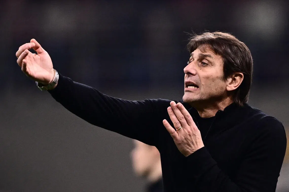 Tottenham Hotspur's Italian manager Antonio Conte giving instructions during the Champions League round of 16, first leg football match between AC Milan and Tottenham Hotspur on Tuesday.