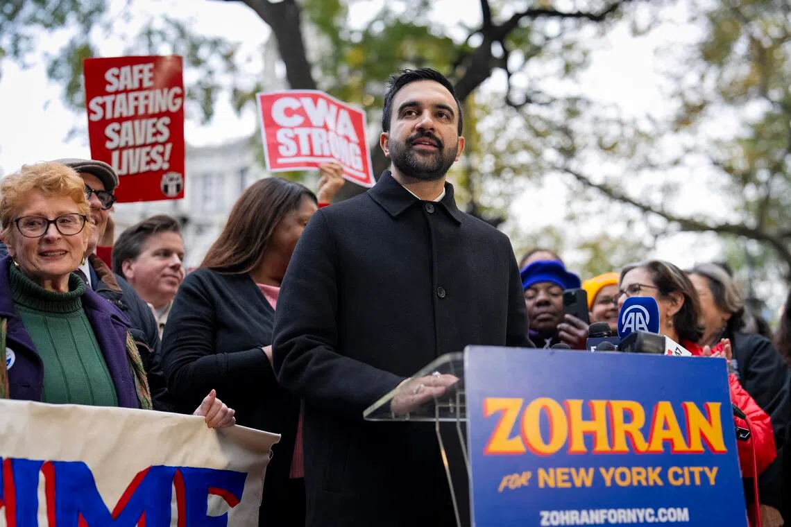 Mr Zohran Mamdani, the mayor-elect of New York City, speaking at a press conference in City Hall Park on Nov 3. When he takes office on Jan. 1, he will seek to move quickly to implement his affordability plans and respond to threats from President Donald Trump.