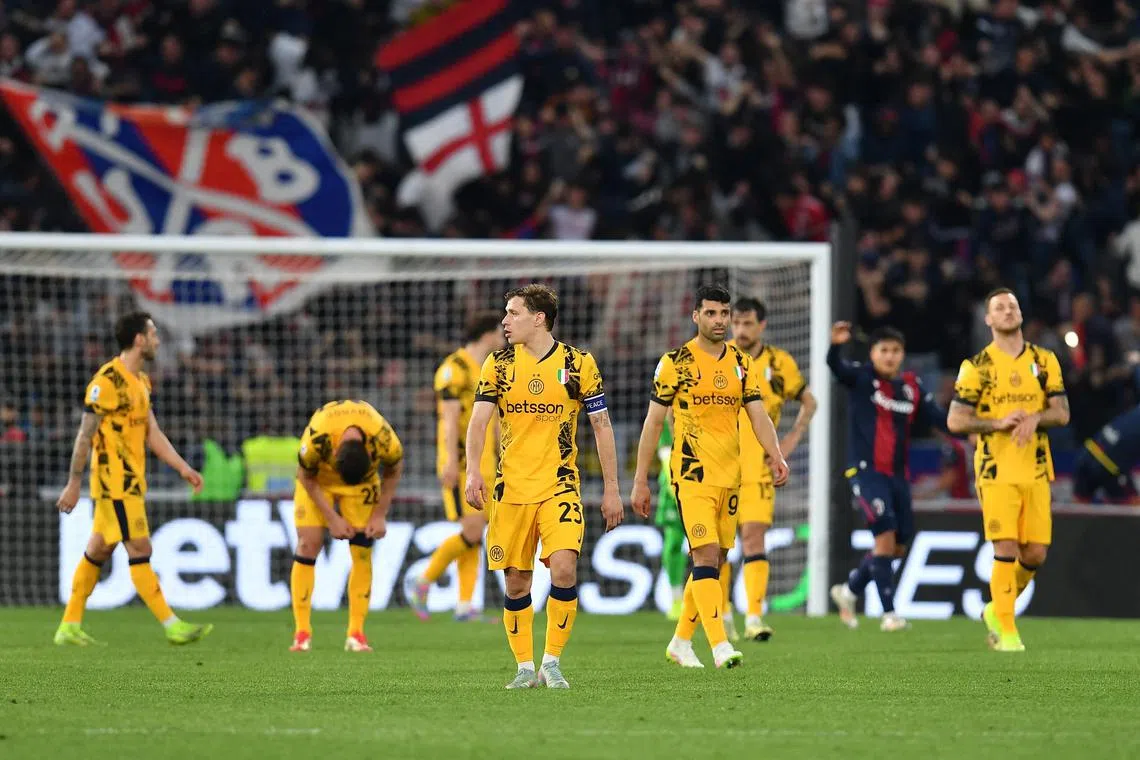 Soccer Football - Serie A - Bologna v Inter Milan - Stadio Renato Dall'Ara, Bologna, Italy - April 20, 2025 Inter Milan's Nicolo Barella looks dejected after Bologna's Riccardo Orsolini scores their first goal REUTERS/Jennifer Lorenzini