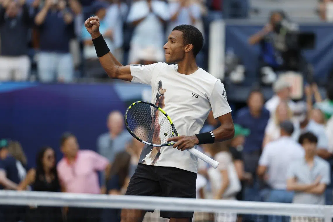 Canada's Felix Auger Aliassime celebrates after beating Australia's Alex de Minaur in the US Open quarter-finals.