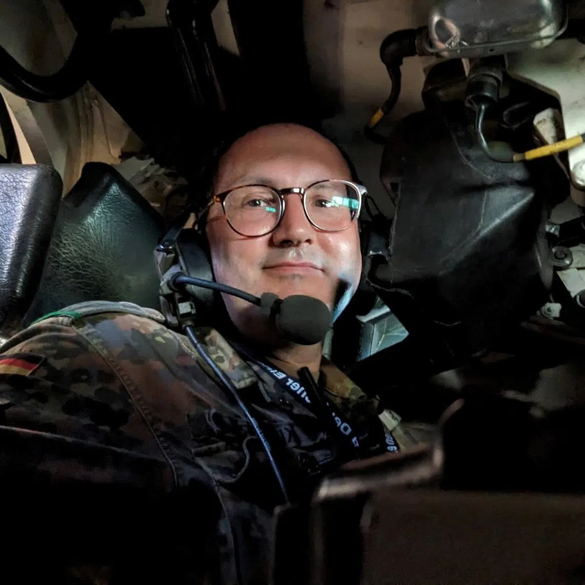 FILE PHOTO: The German Armed Forces' First Lieutenant Matt Kuppers, who later co-founded the venture capital firm Defence Invest, operates an armed combat vehicle during an exercise in a NATO military training area at an undisclosed location in Germany, May 2024. Matt Kuppers/Handout via REUTERS/ File Photo
