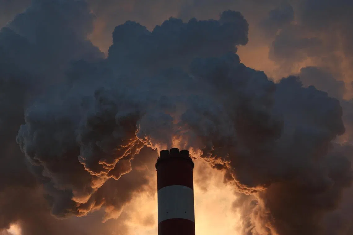 Smoke and steam billow from Belchatow Power Station, Europe's largest coal-fired power plant, in Rogowiec, Poland.