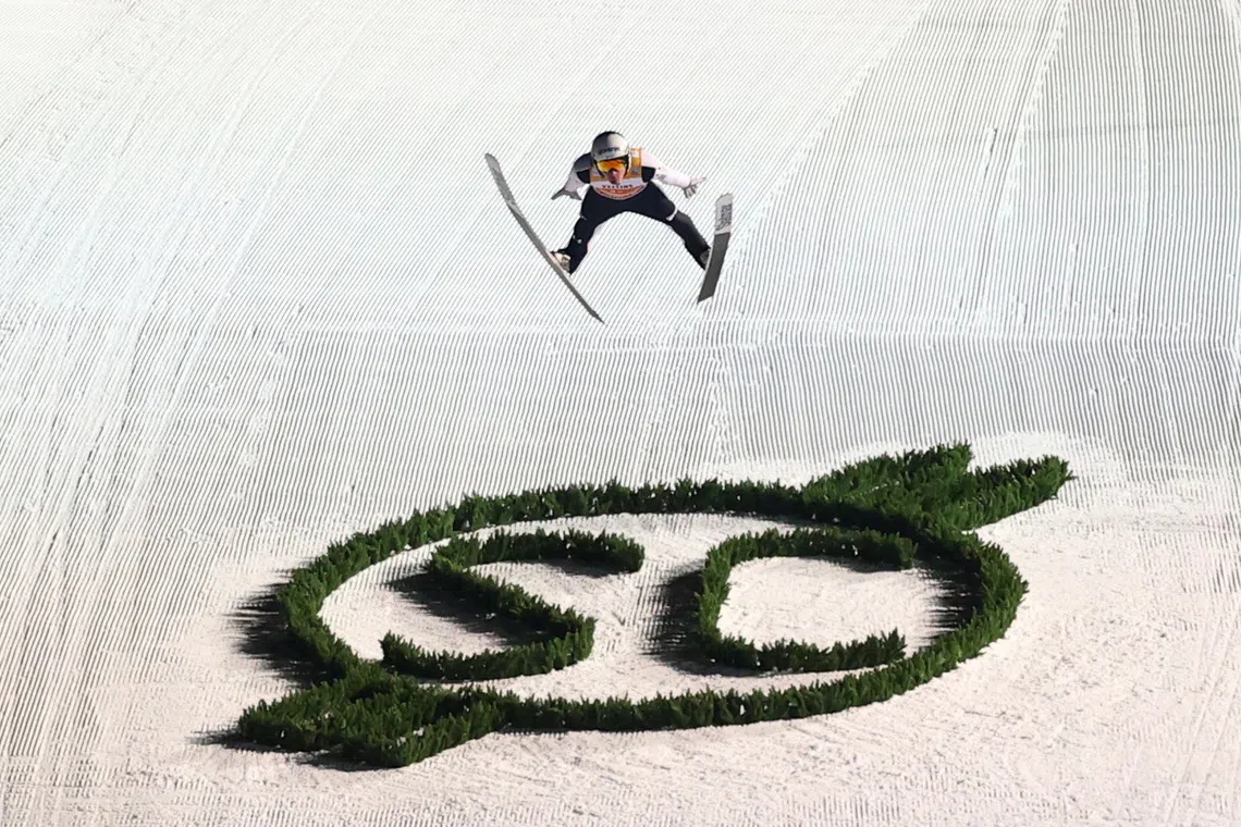 Ski Jumping - Four Hills Tournament - Oberstdorf, Germany - December 29, 2025 Slovenia's Domen Prevc in action during the final round REUTERS/Kai Pfaffenbach