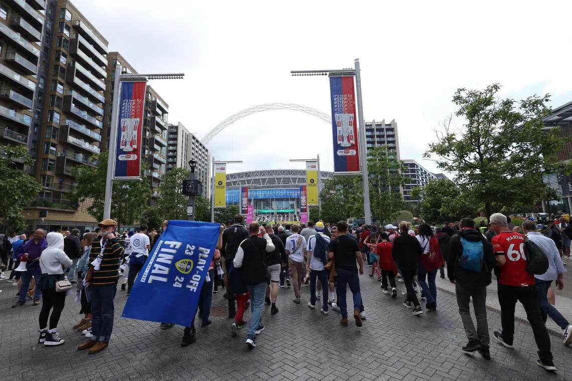 Fans arriving at Wembley for the Championship play-off final between Leeds United and Southampton on May 26, 2024.