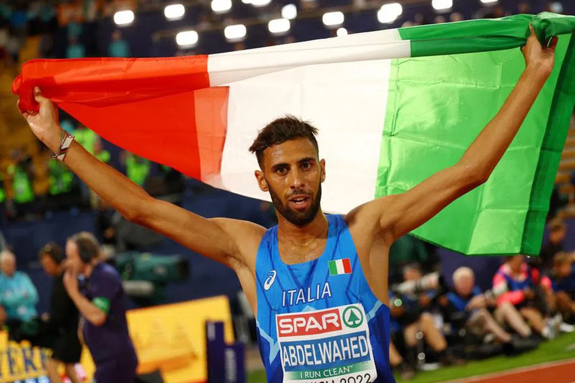 FILE PHOTO: Athletics - 2022 European Championships - Olympiastadion, Munich, Germany - August 19, 2022 Italy's Ahmed Abdelwahed celebrates after winning silver in the men's 3000m steeplechase final REUTERS/Kai Pfaffenbach/File Photo