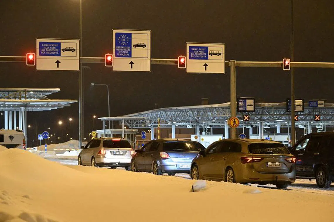 FILE PHOTO: Cars in line wait for the closed Vaalimaa border checkpoint between Finland and Russia to reopen, in Virolahti, Finland on December 13, 2023. Heikki Saukkomaa/Lehtikuva/via REUTERS/File Photo