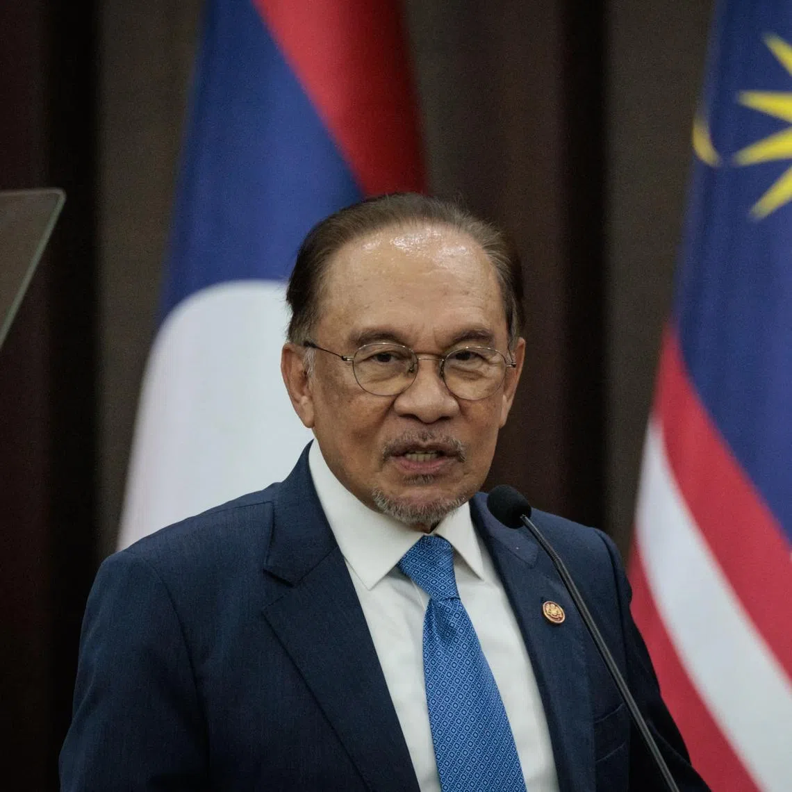Malaysia's Prime Minister Anwar Ibrahim delivers a speech in Jakarta on July 29.