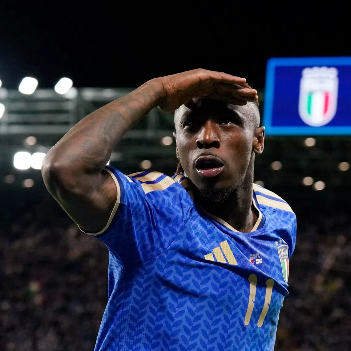 Italy's Moise Kean celebrates scoring their second goal.