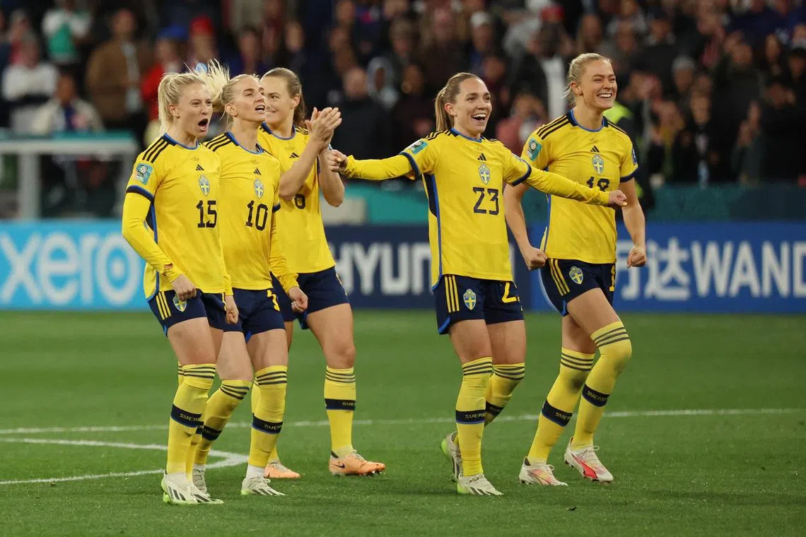 Sweden players celebrating during their Women's World Cup last-16 penalty shoot-out win over holders the United States at Melbourne Rectangular Stadium on Sunday.