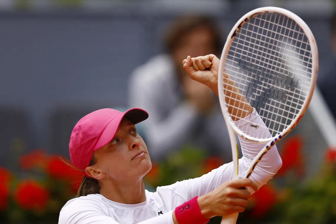 Poland's Iga Swiatek celebrates winning her semi-final match against Madison Keys of the US.