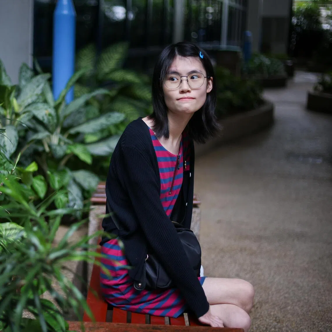 Student of visual communications at the Nanyang Academy of Fine Arts Abigail Chua, 20, inherited her rare condition from her mother. 

ST PHOTO: JASON QUAH