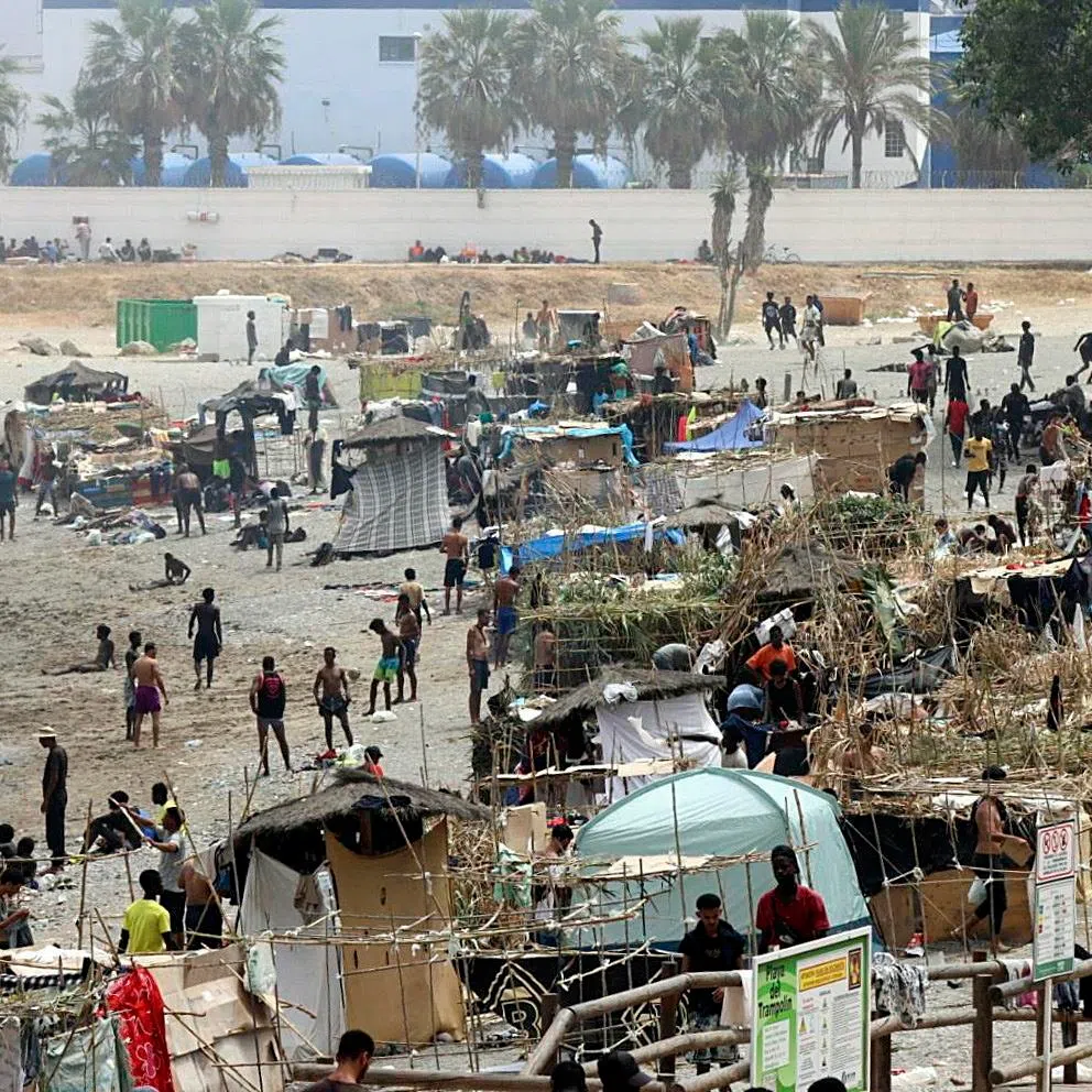 Trampolin Beach in the Spanish North African enclave of Ceuta has undergone a rapid transformation: a small cluster of makeshift shelters less than a week ago has expanded to more than 80.