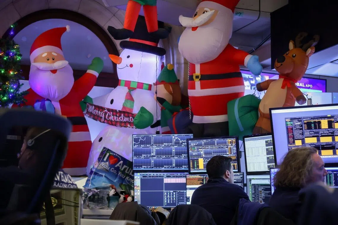 Traders working on the floor of the New York Stock Exchange, in New York City, on Dec 22.
