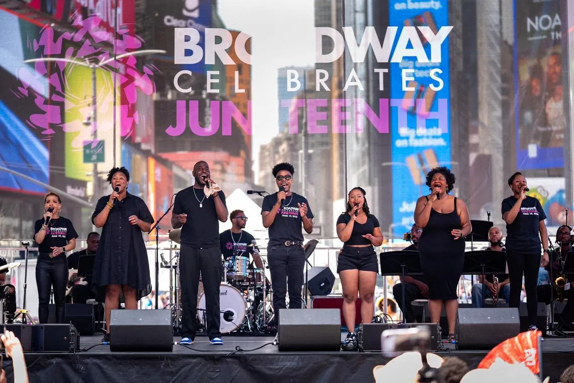 People perform during the Broadway Celebrates Juneteenth concert at Times Square in New York City, US, on June 19.