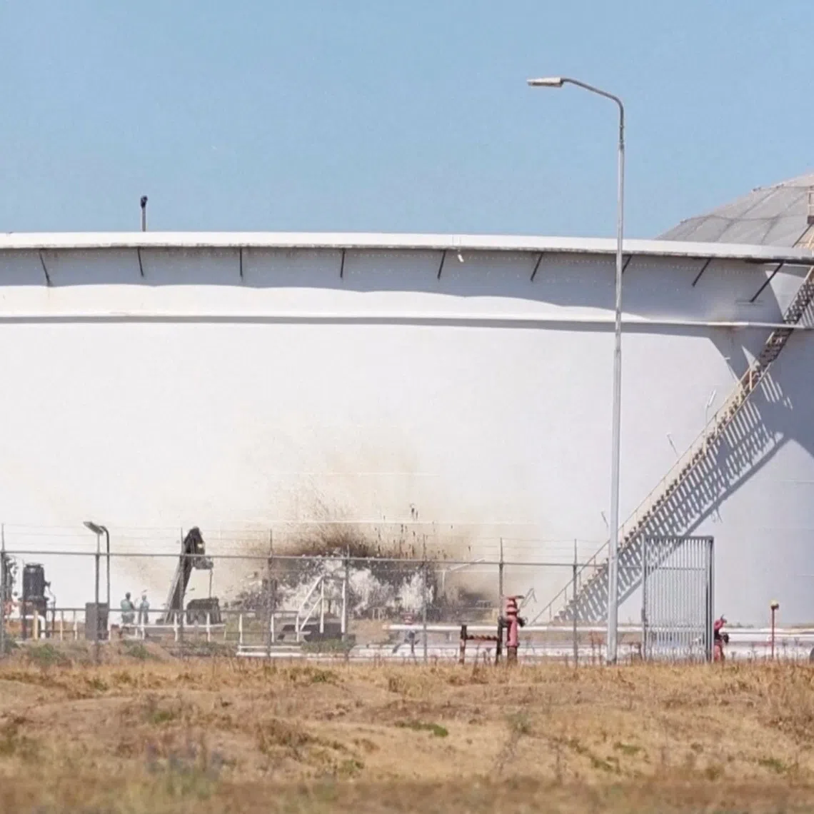 The local safety authorities and police said they were still investigating if there was a link between earlier power outages at the port and the blast.