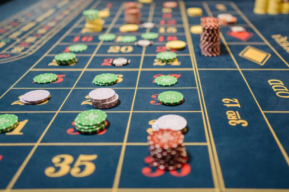 The scheme sold packages promising lucrative returns from the winnings of professional gamblers playing baccarat at casinos.