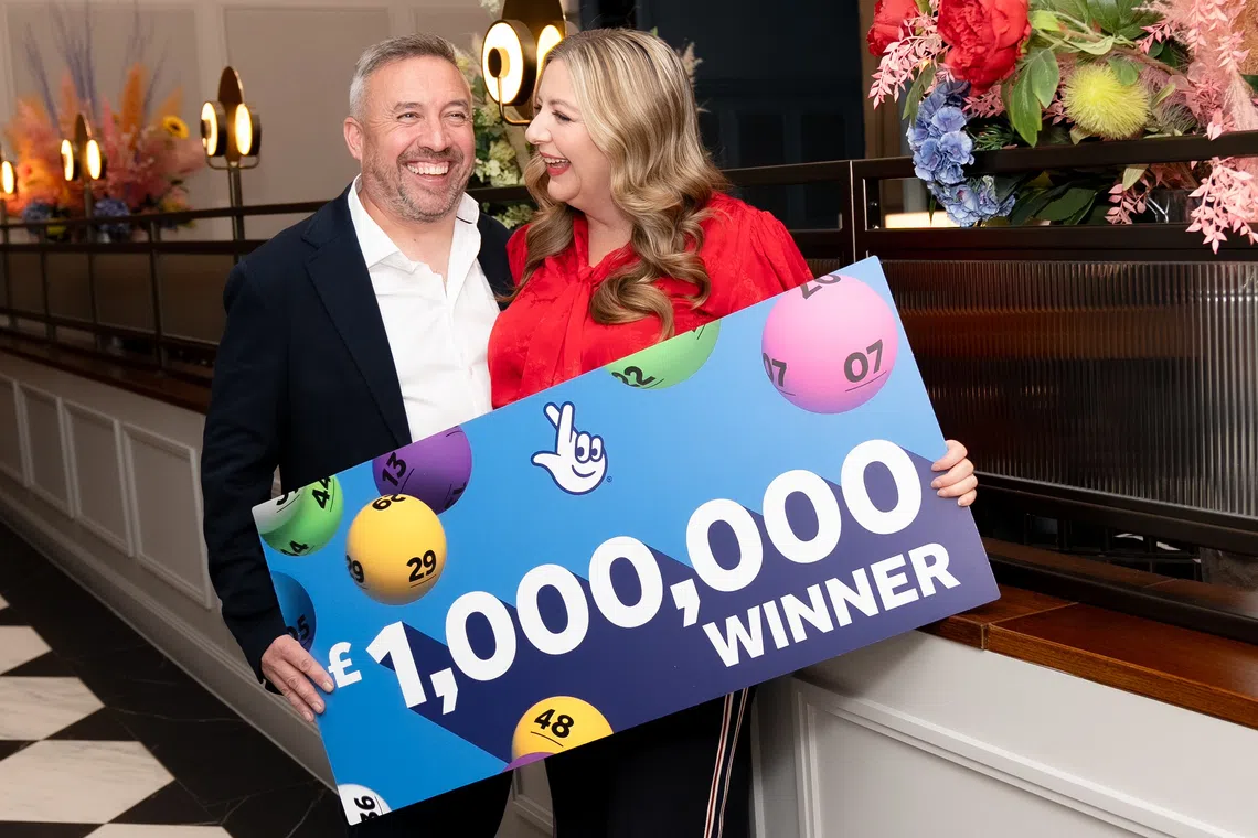 Mr Richard Davies and his wife Faye Stevenson-Davies defied the odds of more than 24 trillion to one to win the Lotto draw on Nov 26.