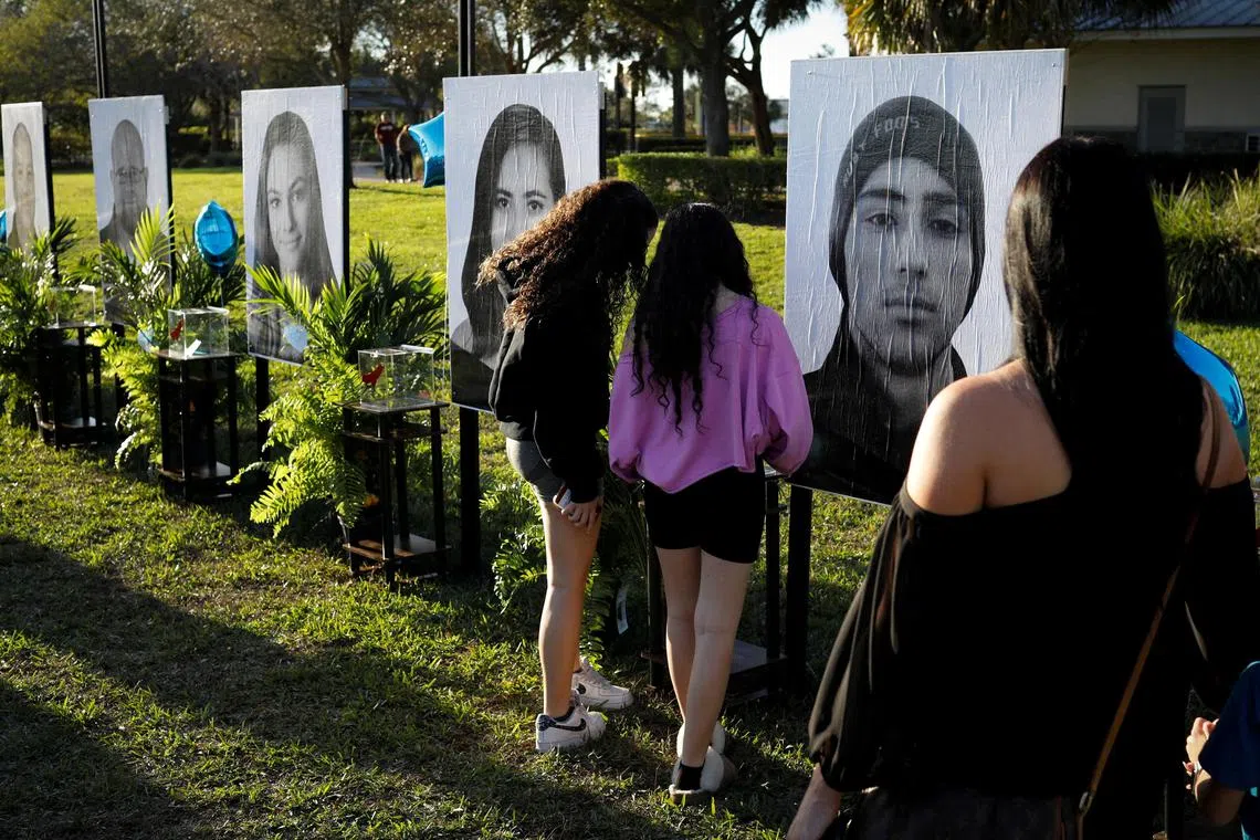 People attend a memorial service for the five-year anniversary of the Florida high school shooting in February 2023.