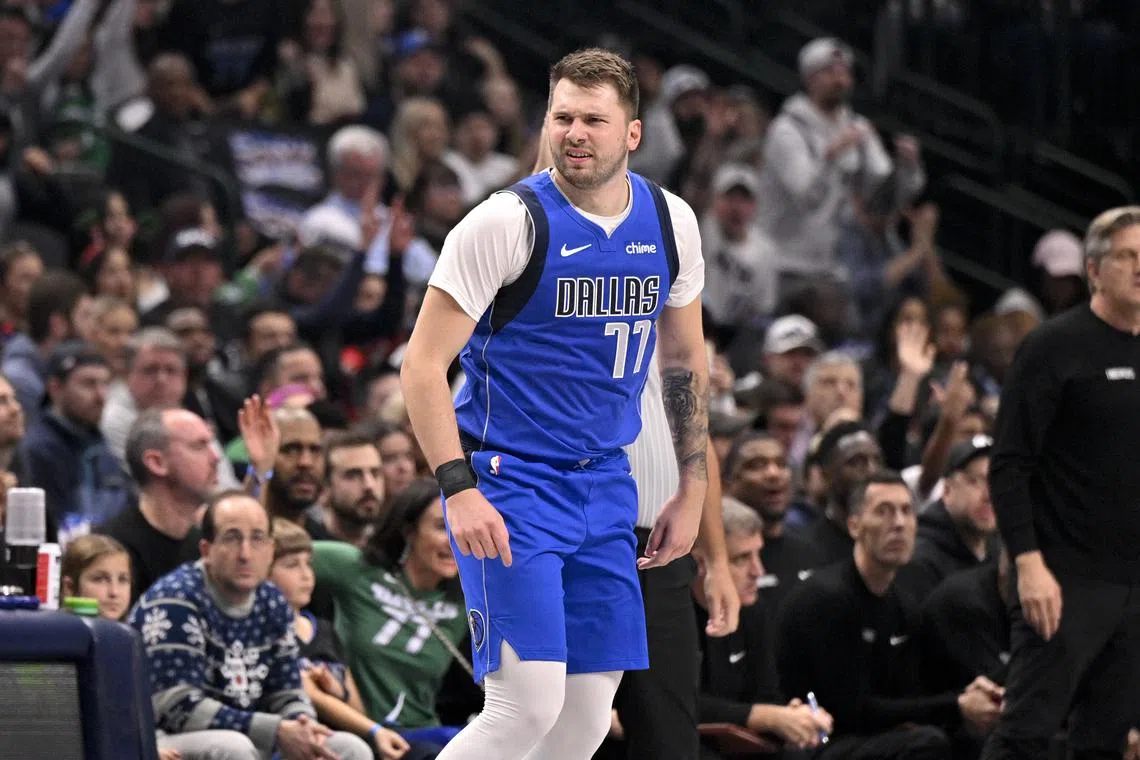 FILE PHOTO: Dec 25, 2024; Dallas, Texas, USA; Dallas Mavericks guard Luka Doncic (77) celebrates during the game between the Dallas Mavericks and the Minnesota Timberwolves at the American Airlines Center. Mandatory Credit: Jerome Miron-Imagn Images/File Photo