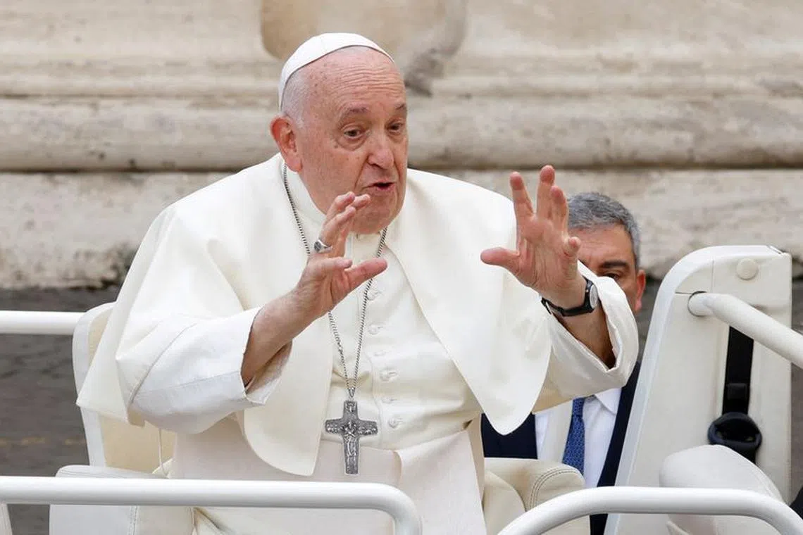 Pope Francis gestures as he leaves after the weekly general audience, in Saint Peter's Square at the Vatican, November 15, 2023. REUTERS/Remo Casilli