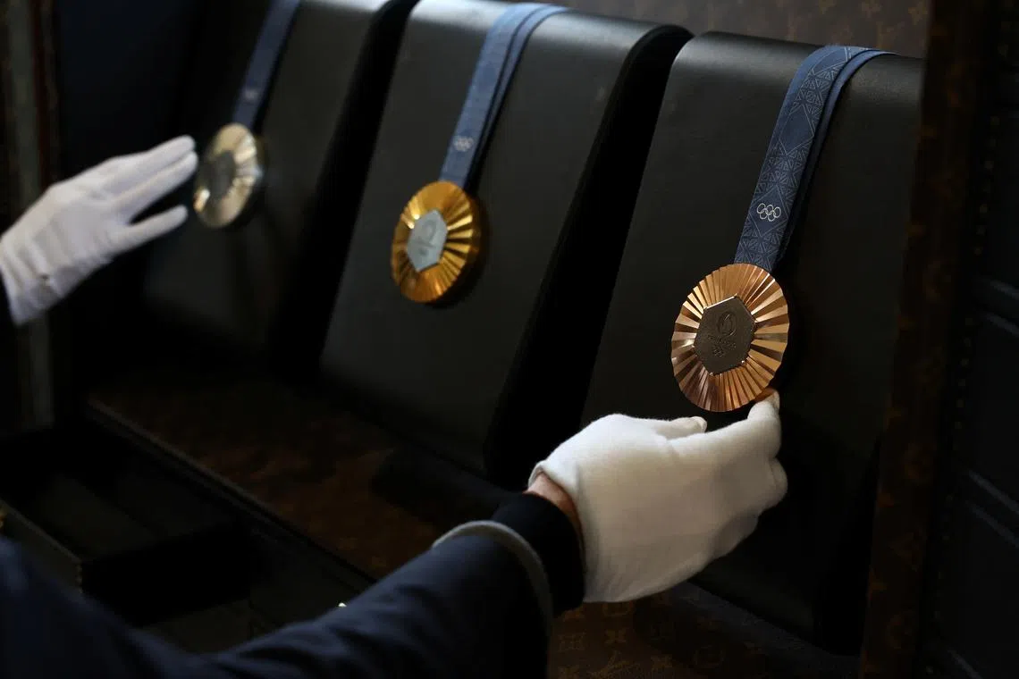 Olympics - Louis Vuitton makes custom trunks for Paris Games flames ...