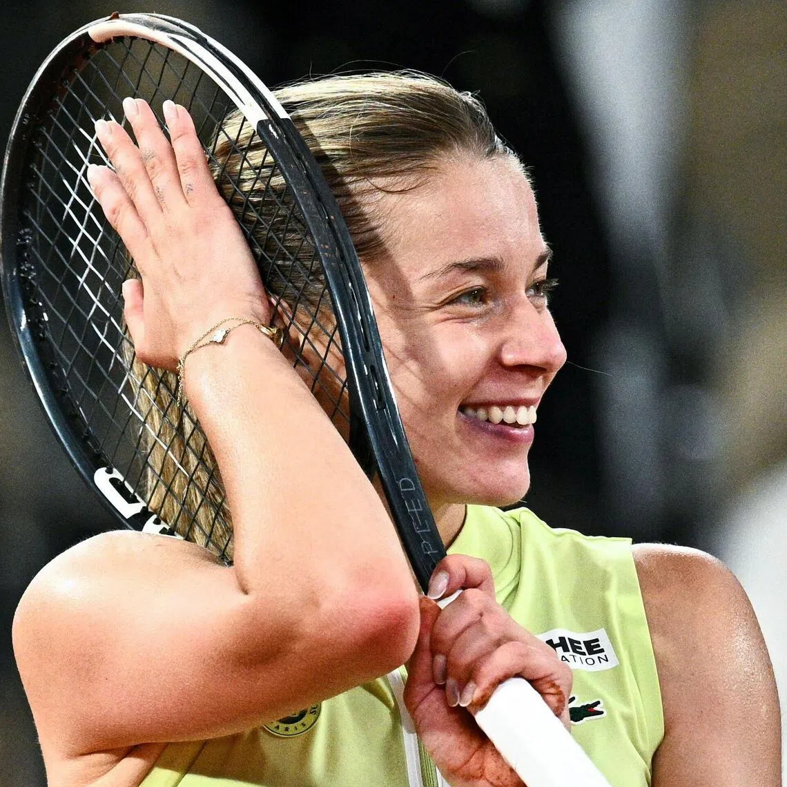 Poland's Maja Chwalinska celebrates after beating Russian Diana Shnaider 7-6 (7/4), 6-4 in their French Open semi-final on June 4.