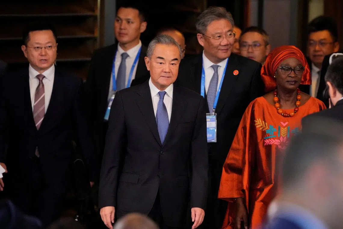 China's Foreign Minister Wang Yi arrives at the ministerial conference during the 2024 Summit of the Forum on China-Africa Cooperation (FOCAC) held at the Diaoyutai State Guesthouse in Beijing, China Sep. 3, 2024.   Ken Ishii/Pool via REUTERS