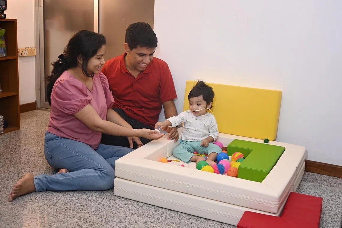 Mr Achintha Pilapitiya, and Ms Dulanjali Wakwella, both 33, and their 16 month old son Shamel who suffers from spinal muscular atrophy. Photo was taken on 26 Jan 2023 at their HDB flat in Choa Chu Kang Crescent. 

The parents of 16-month-old baby Shamel, who was diagnosed with type 2 Spinal Muscular Atrophy (SMA), are trying to raise $3 million for him to receive Zolgensma, a form of gene therapy
