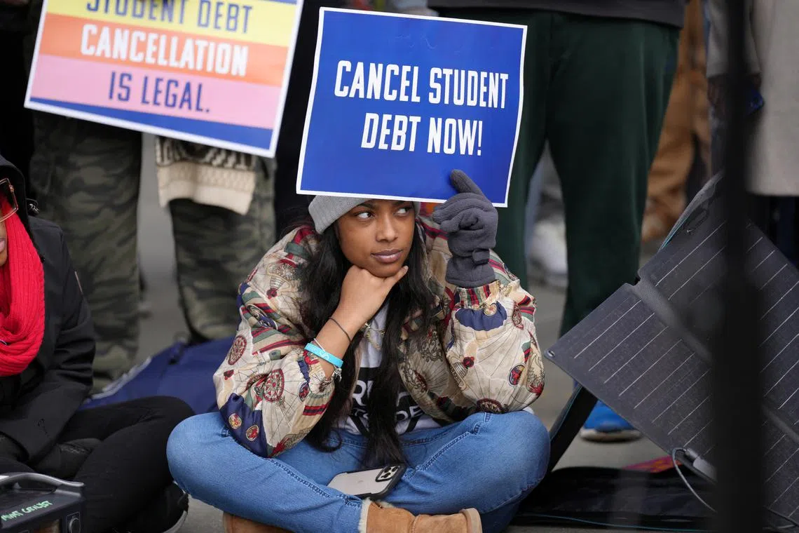 Demonstrators in favour of Mr Biden’s debt relief plan rallied outside the court. 