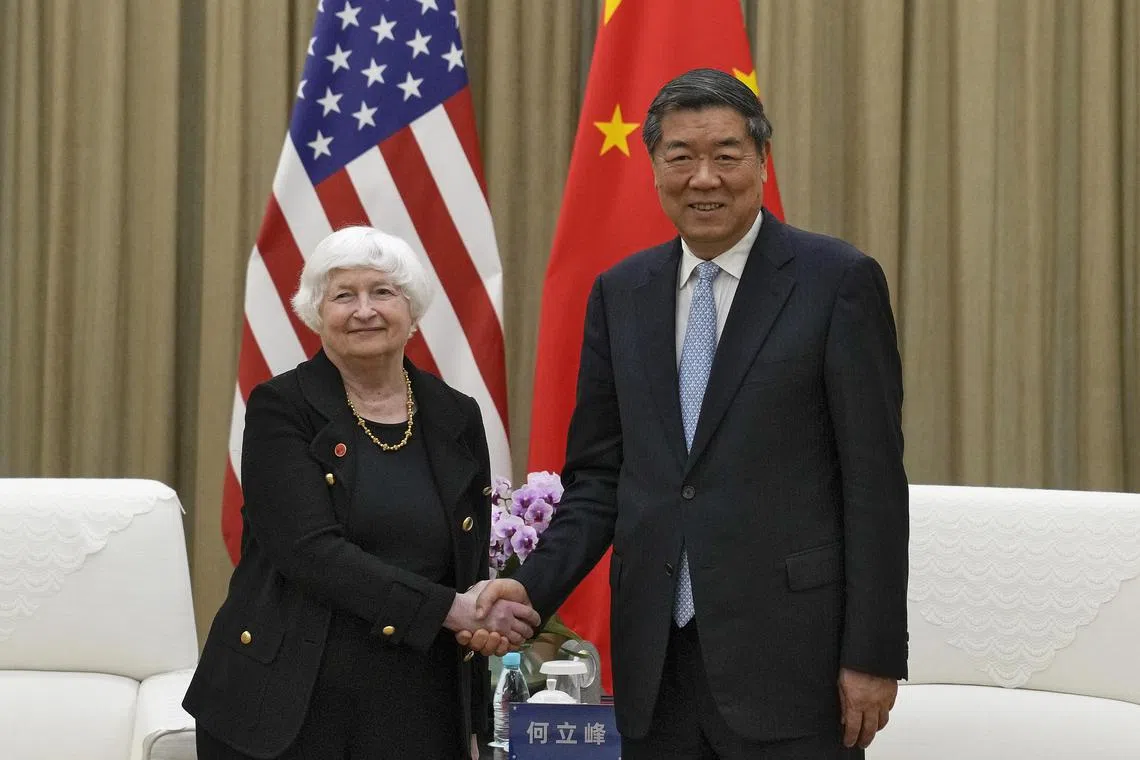 U.S. Treasury Secretary Janet Yellen (L) shakes hands with Chinese Vice Premier He Lifeng, the czar for economic policy, on April 6 2024.  