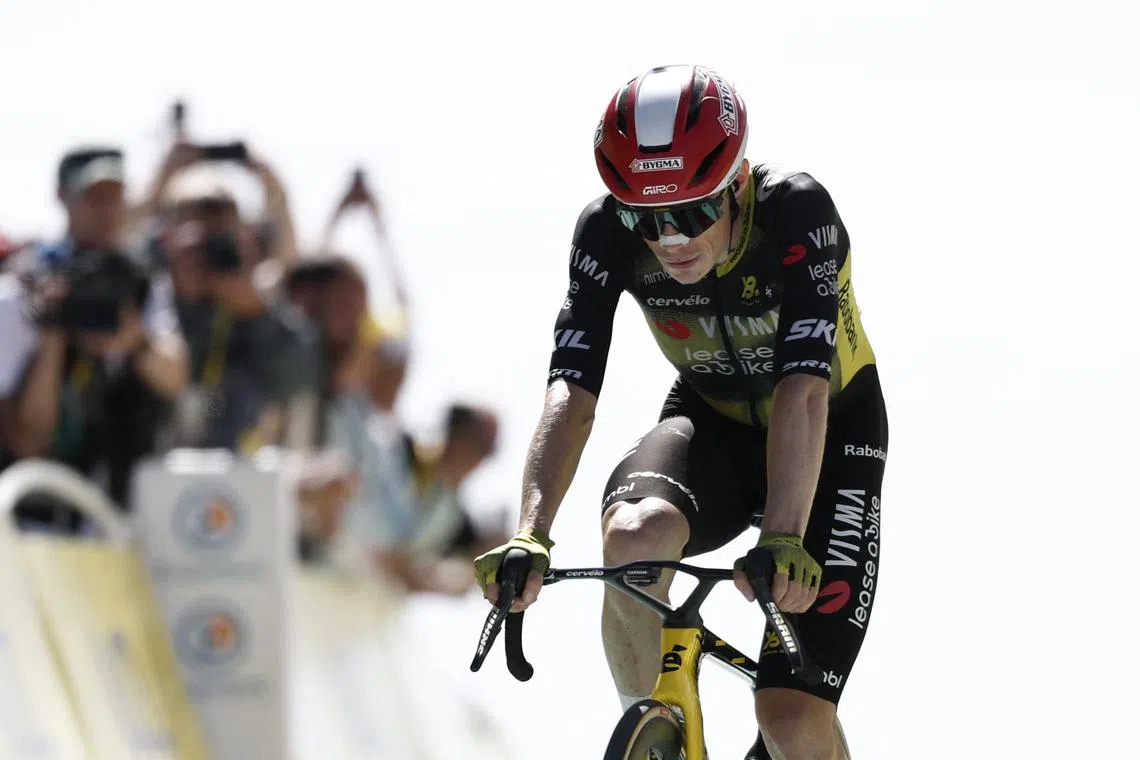 FILE PHOTO: Cycling - Tour de France - Stage 16 - Montpellier to Mont Ventoux - Mont Ventoux, France - July 22, 2025 Team Visma | Lease a Bike's Jonas Vingegaard crosses the finish line after stage 16 REUTERS/Benoit Tessier/File Photo