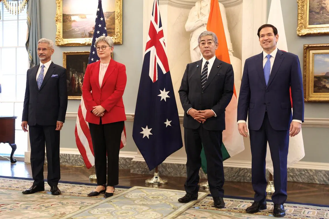 FILE PHOTO: Indian External Affairs Minister Subrahmanyam Jaishankar, Australia’s Foreign Minister Penny Wong, Japanese Foreign Minister Takeshi Iwaya and U.S. Secretary of State Marco Rubio stand together at the start of their meeting of the Indo-Pacific Quad at the State Department in Washington, D.C., U.S., July 1, 2025. REUTERS/Kevin Lamarque/File Photo